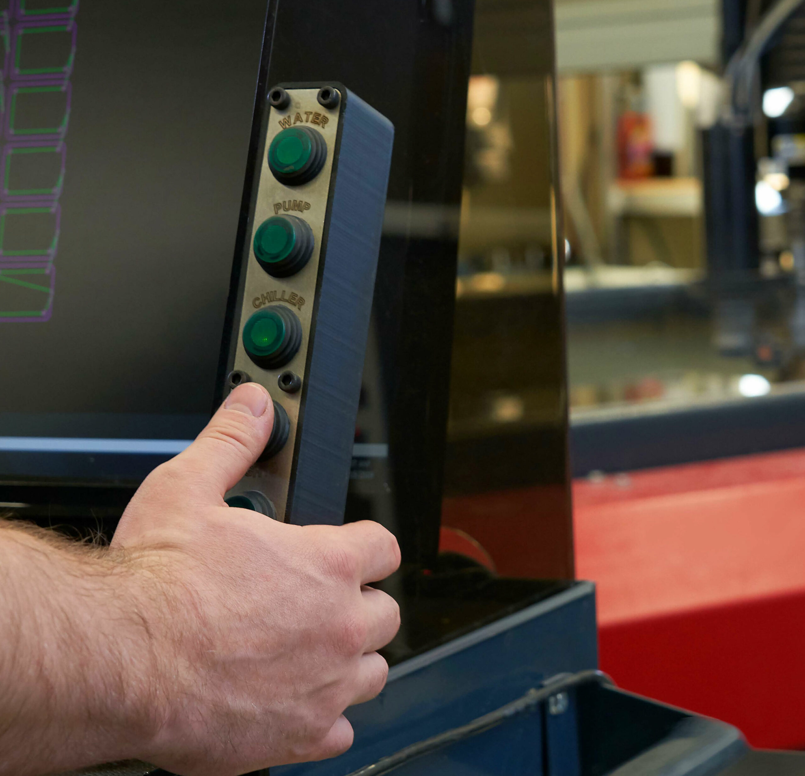 A person using an industrial 3d printer